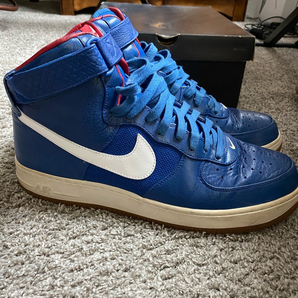 Nike Men's Blue High-Top Sneakers with White Swoosh